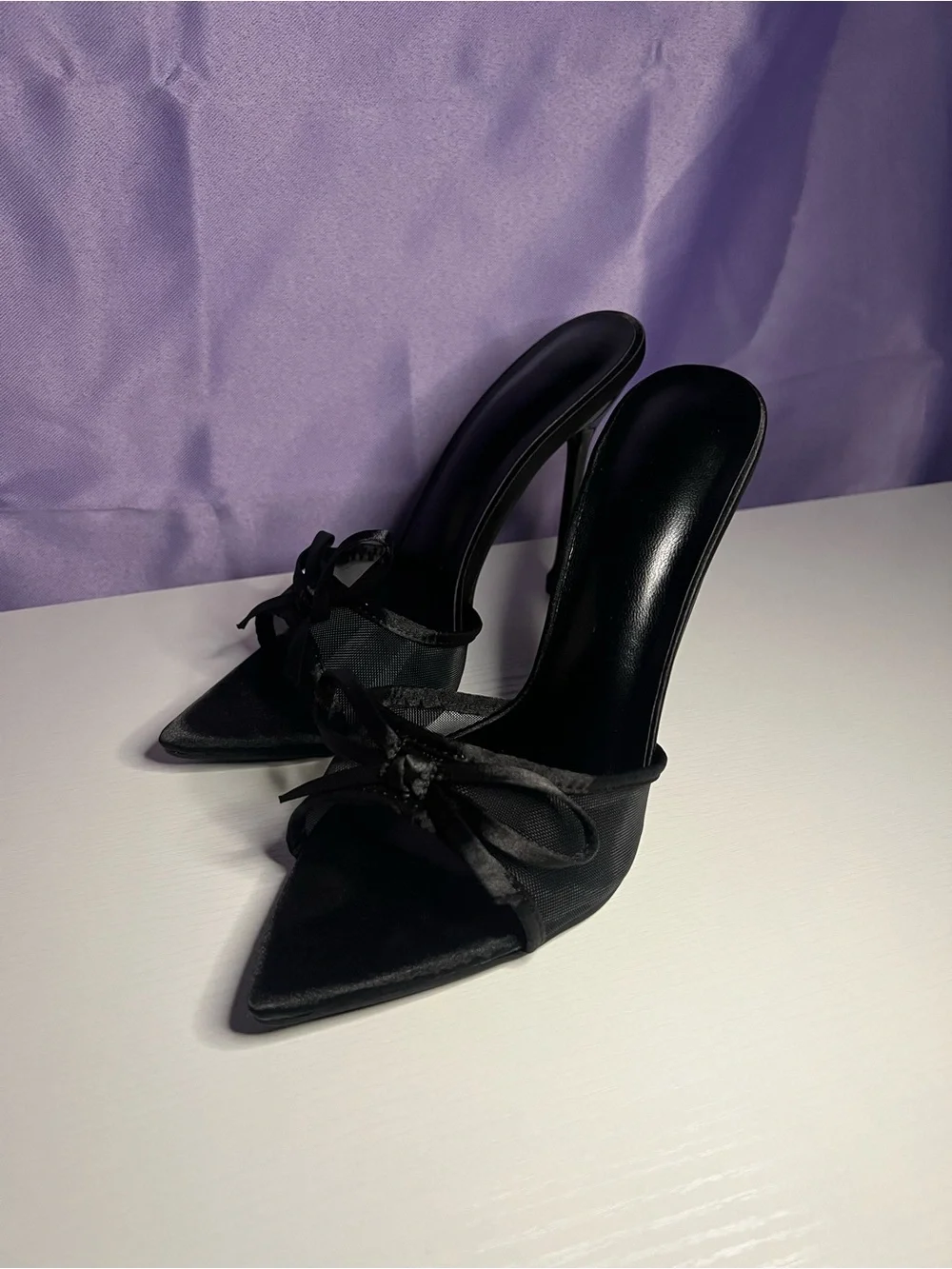 Elegant Black Pointed Toe Slide Heels with Bow Detail